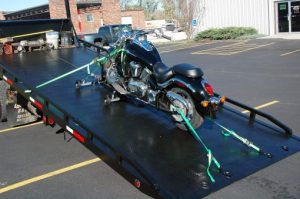 motorcycle tow truck loading and securing