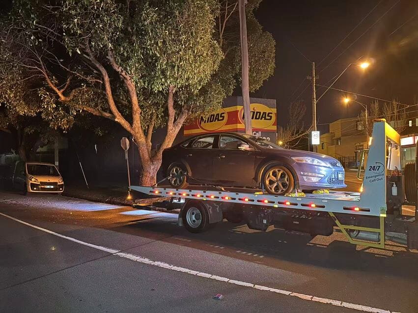 Towing Box Hill – black sedan towed from roadside near Midas workshop