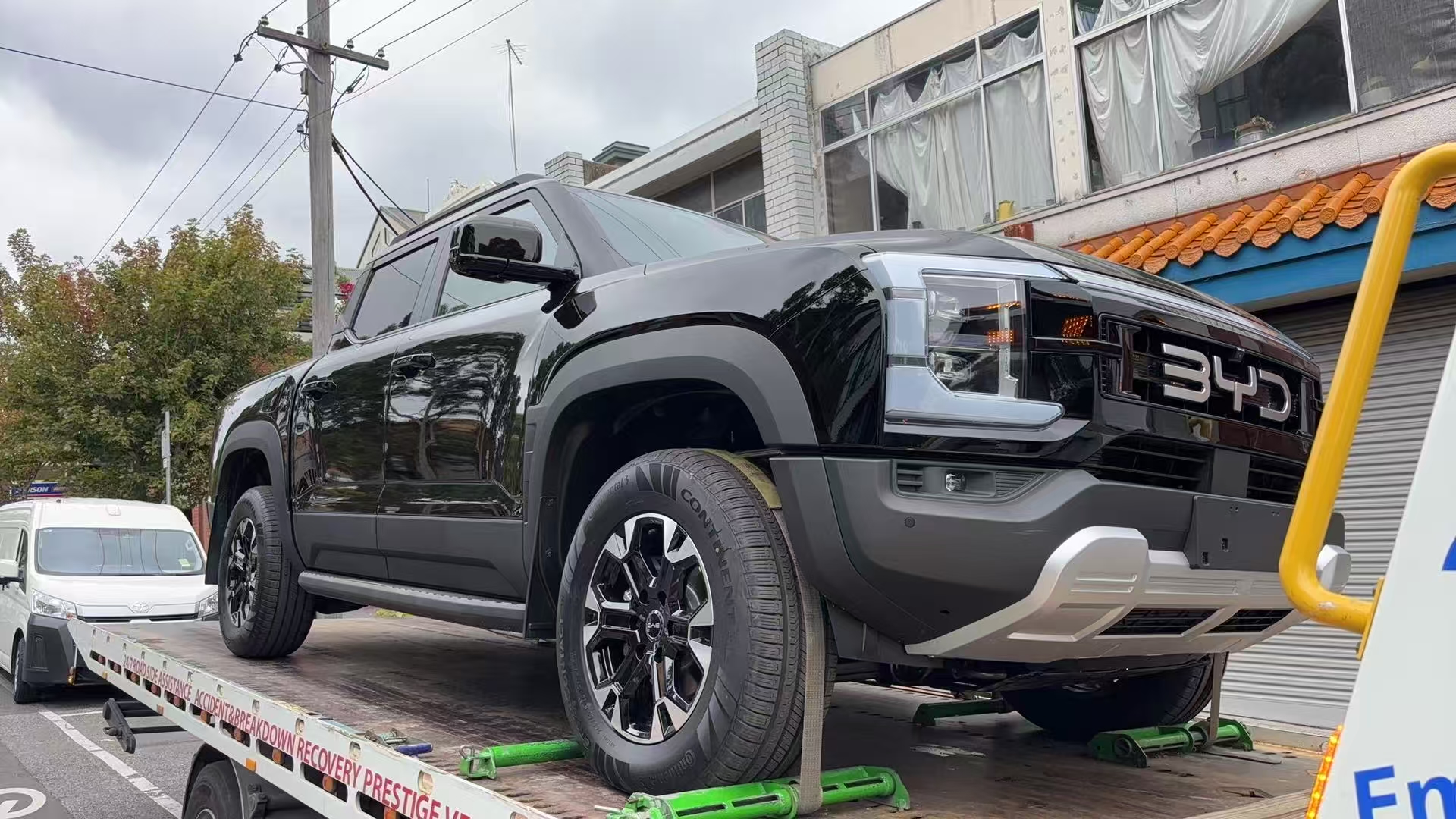 BYD ute loaded onto a tow truck for transport in Melbourne